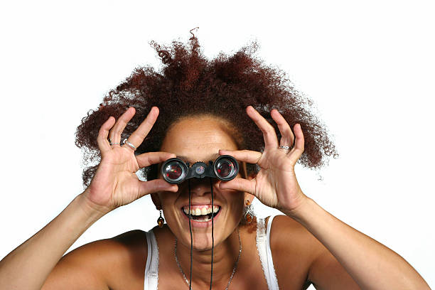 istock Happy woman with binoculars 172218348