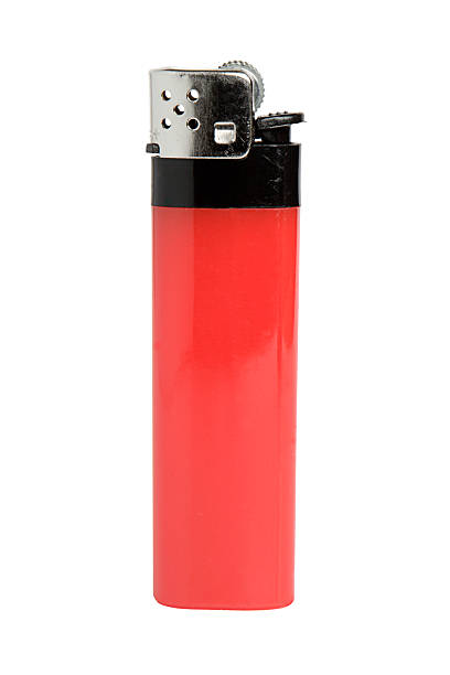 Lighter A red lighter, isolated on white background. cigarette lighter stock pictures, royalty-free photos & images