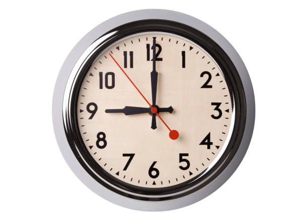 Retro Wall Clock Set to 9:00 stock photo