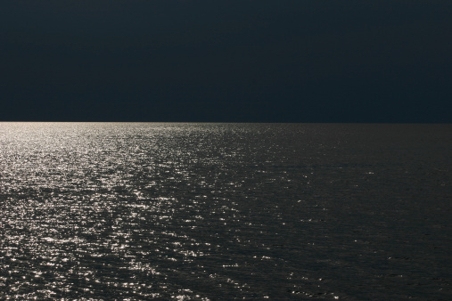 Moonlight shining on the water. Great for background.