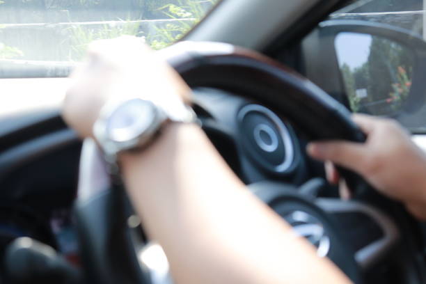 istock Defocused of someone driving a car 1722201285
