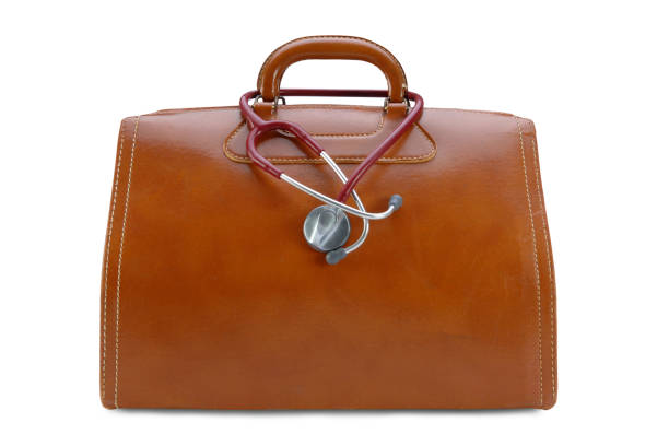 Doctor's Bag with Path Leather doctor's bag and stethoscope. Clipping path included. doctors bag stock pictures, royalty-free photos & images