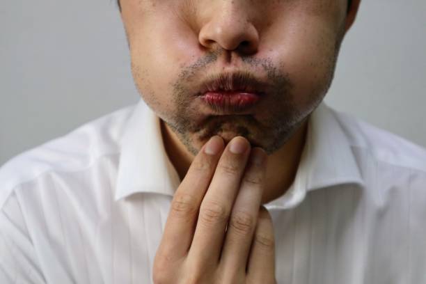 istock Japanese man suffering from hairy beard 1722212391