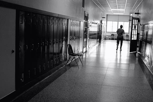 Black and White Photo of a School Hallway stock photo