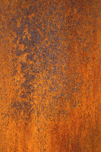 Macro photo of a rusty pipe. Since the subject is round and the depth of field rather small, the center is in focus, the top and bottom a little less so, and the left and right are significantly more blurred. There is plenty of detail in here for some great backgrounds, so enjoy.