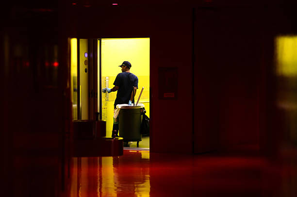 Janitor Janitor at elevator. Please let me know how you use it, thank you! custodian stock pictures, royalty-free photos & images