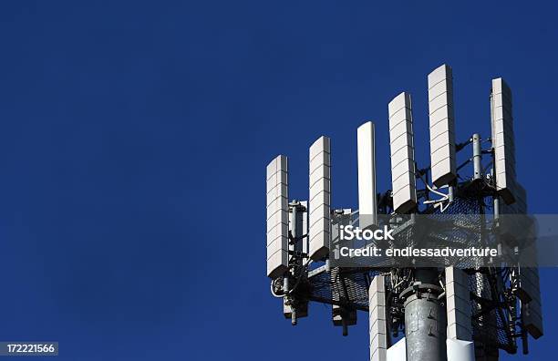 Cell Tower Standing In The Blue Sky Stock Photo - Download Image Now - Telecommunications Equipment, Global Communications, Abstract