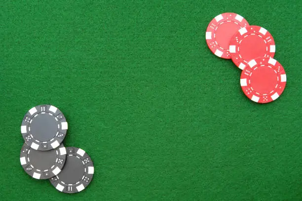 Photo of Casino chips on green felt