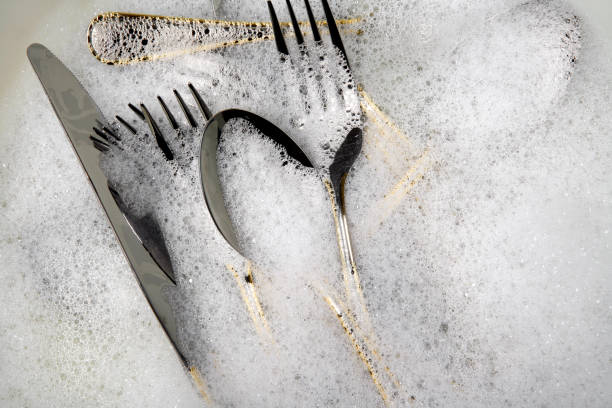 istock Cutlery in soap suds 172222038