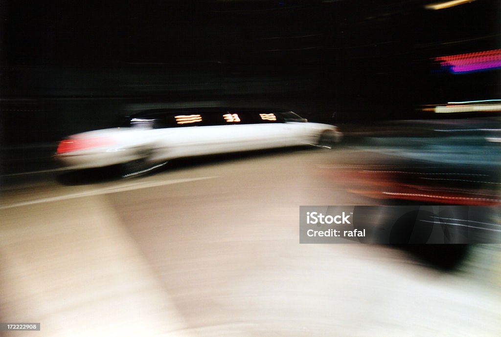 Limousine Night Out (2) Motion blur of a limousine passing by at night. Fame Stock Photo