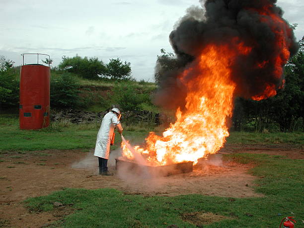 Fogo figther trabalho - foto de acervo