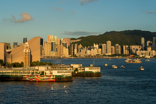 Aerial view panoramic of the Hong Kong City Skyline and Victoria Harbour at sunset at china