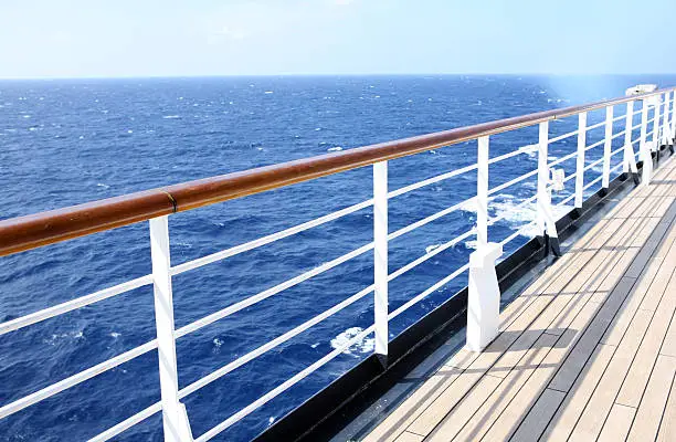 Watching the horizon from a cruise ship deck