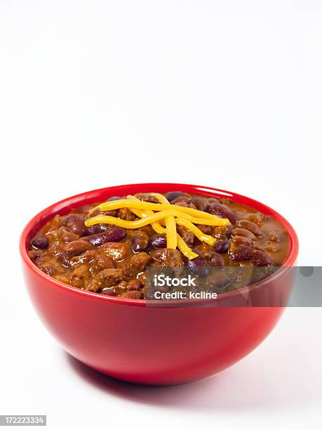 A Red Bowl Full Of Chili On A White Background Stock Photo - Download Image Now - Chili Con Carne, Chili Pepper, Bowl