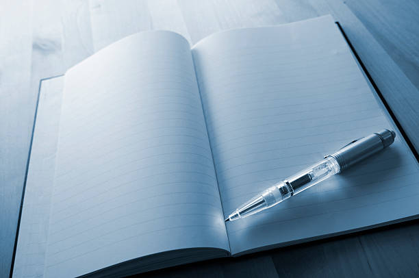 luz caneta de livro - guest book note pad writing diary imagens e fotografias de stock