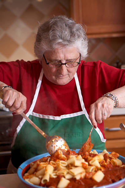 クック - grandmother domestic life cooking domestic kitchen ストックフォトと画像