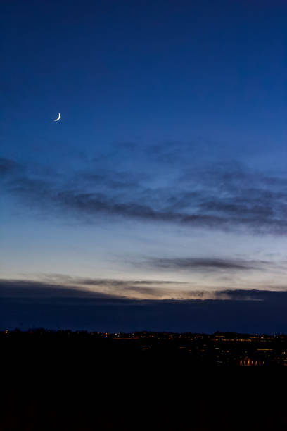 istock Lethbridge - wildfire smoke at dusk with crescent moon 1722243505