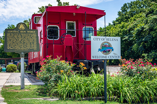 Helena, Alabama, USA-July 15, 2023: The welcome center for the City of Helena is found inside a caboose from the Louisville and Nashville Railroad found in historic Old Town.