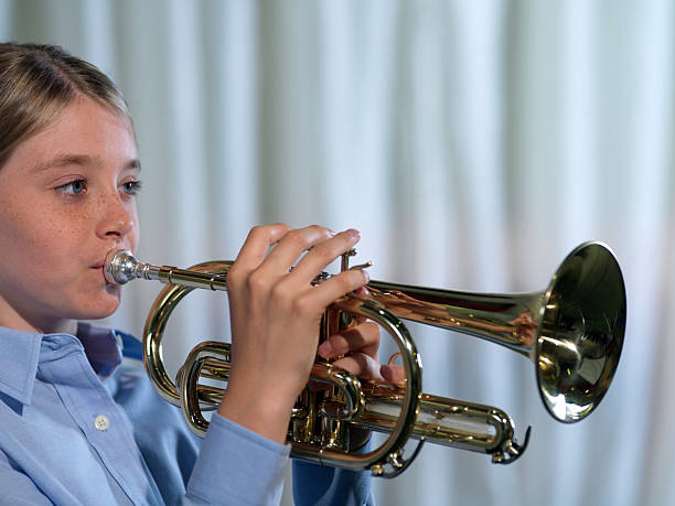 istock Girl playing musical instrument 172224439