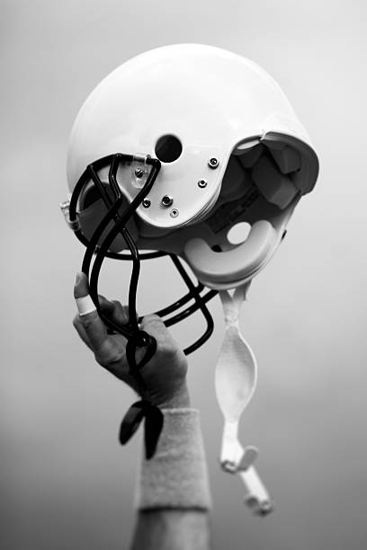 American football helmet in grass
