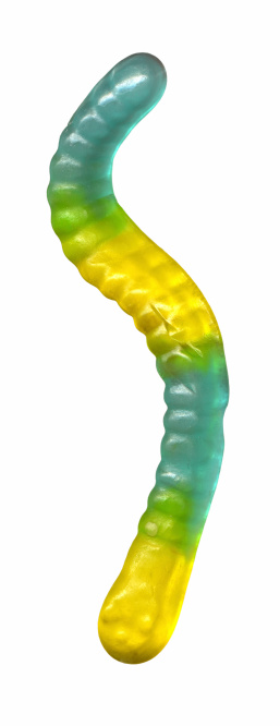 A yellow, green, and blue gummy worm isolated on white.