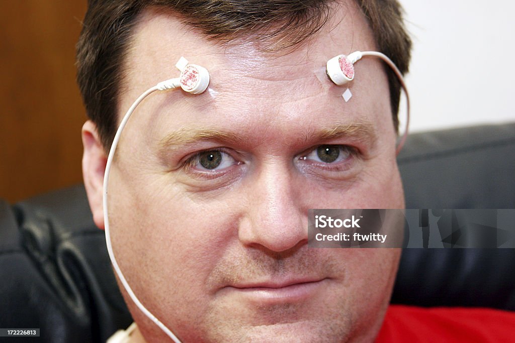 Biofeedback "Man looking at camera, wearing electrodesSimilar images:" Biofeedback Stock Photo