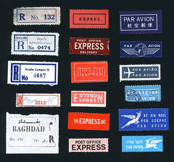 A page from my scrapbook of vintage postage marks. Airmail, Express, and Registered Mail stickers from many different countries. Bulgaria, England, Iraq, Malaysia, Thailand, USA and many more. 17 stickers in all.