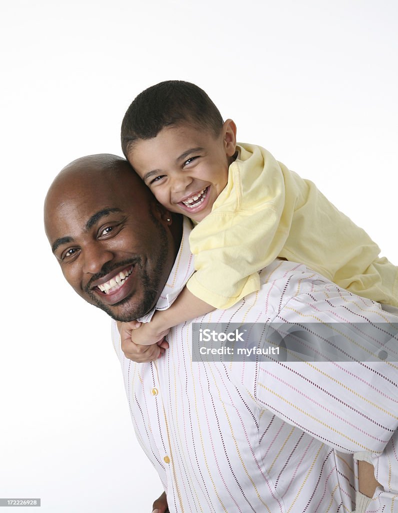 Pai com o filho na parte de trás - Royalty-free Alto - Altura Humana Foto de stock