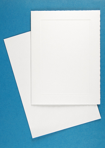 Blank greeting card on white envelope.