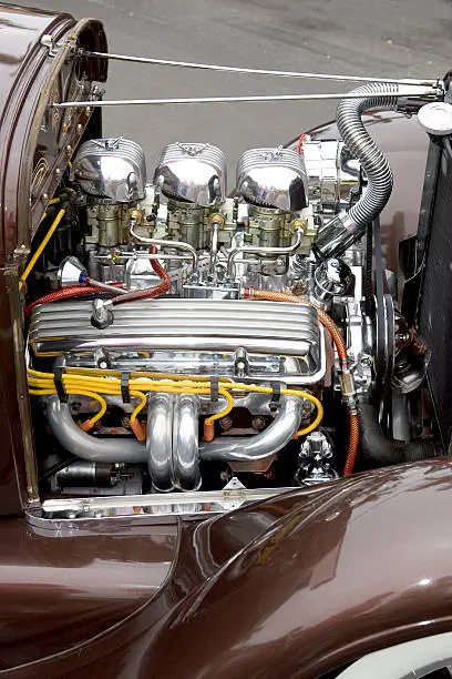 Beautiful Brown Roadster with Chrome V8 and three 2 barrel carburetors