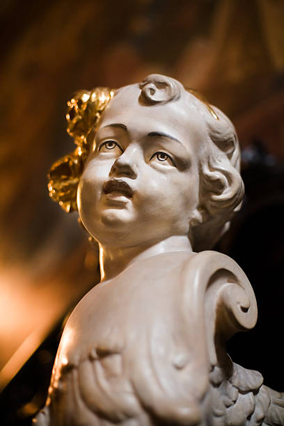 putto - renaissance baroque style sculpture human face fotografías e imágenes de stock