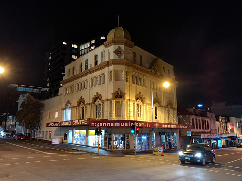 Old fashioned corner building by night in Hobart, the capital city of Tasmania, Australia.