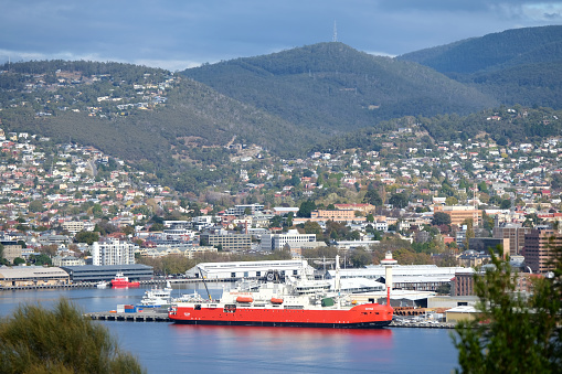 RSV Nuyina icebreaker moored in Hobart's Harbour, Tasmania, the world’s most advanced Antarctic icebreaker, science and resupply ship, 160-metre-long.