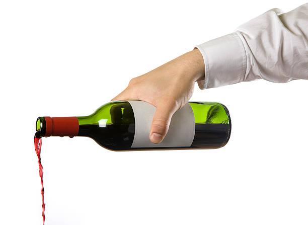 Pouring the Red. stock photo