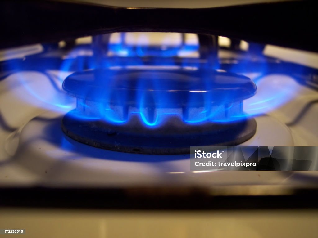 Blue Burner Macro Lit Macro of a blue gas stovetop flames.Clickable series: Aura Stock Photo