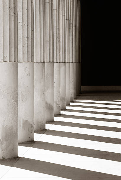 istock A set of columns and their shadows in the sun 172230647
