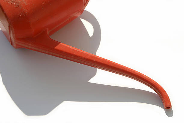 Watering Can With Shadow stock photo