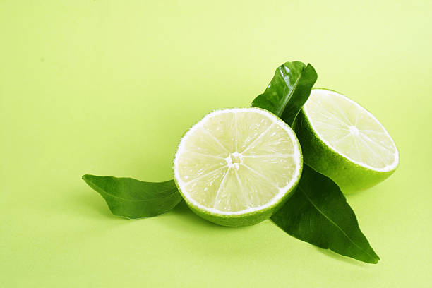 Limes with leafs stock photo