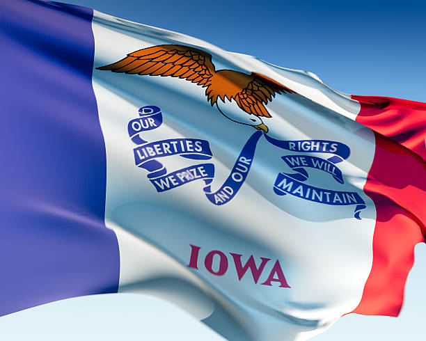 Flag of Iowa Iowa flag waving in the wind. Elaborate rendering including motion blur and even a fabric texture (visible at 100%). iowa flag stock pictures, royalty-free photos & images