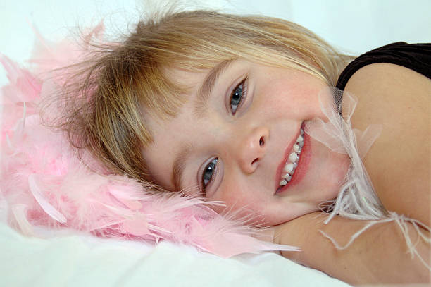 istock Little Princess with a Feather Boa 172231340