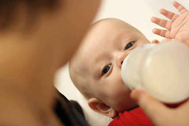 istock Mother feeding baby 172231416
