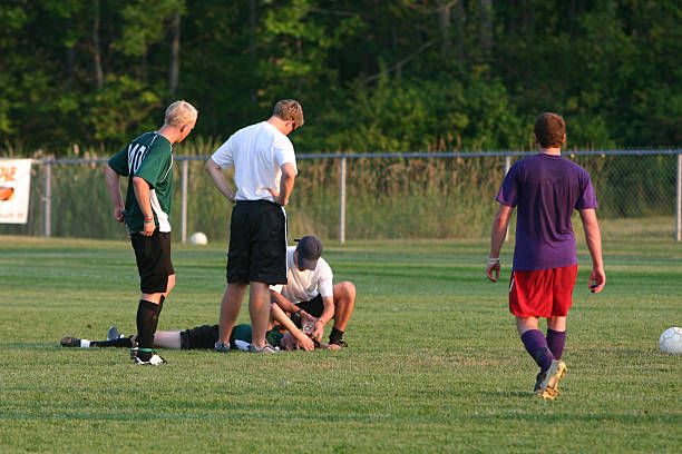 injured player high school soccer player is injured concussion stock pictures, royalty-free photos & images