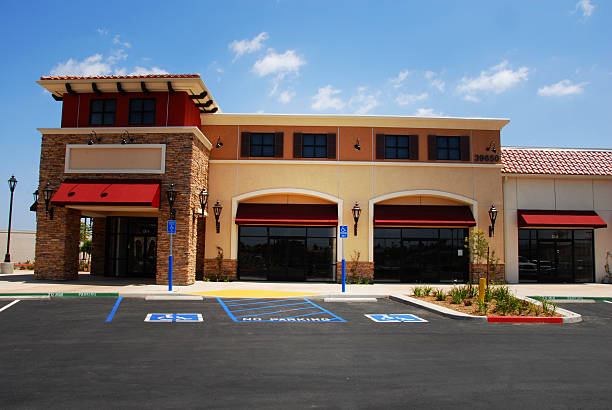 A brand new blank store front in a contemporary strip mall.