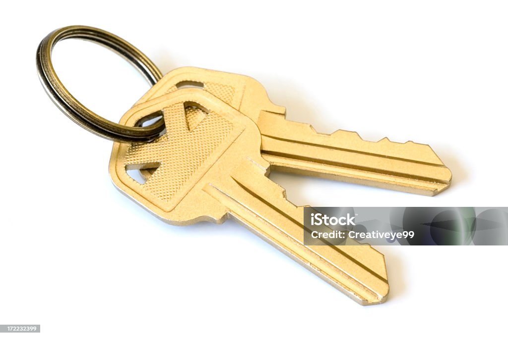 Gold keys Gold keys on white background Key Stock Photo