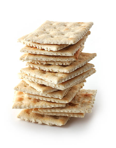 A pile of crackers on white background