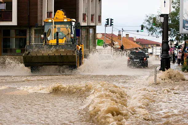 A road awash in Bansko after a sudden rain storm caused a flash flood.