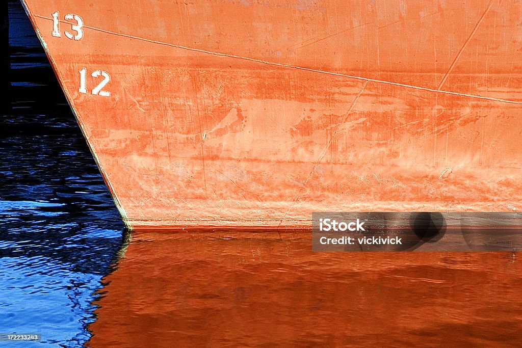 Strahlend orange boot und seine Spiegelung - Lizenzfrei Makrofotografie Stock-Foto