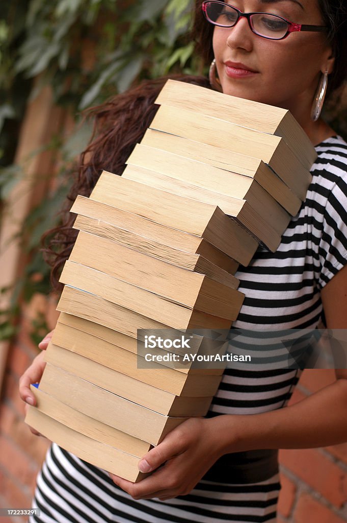 Graziosa Collegio ragazza con libri - Foto stock royalty-free di Adulto