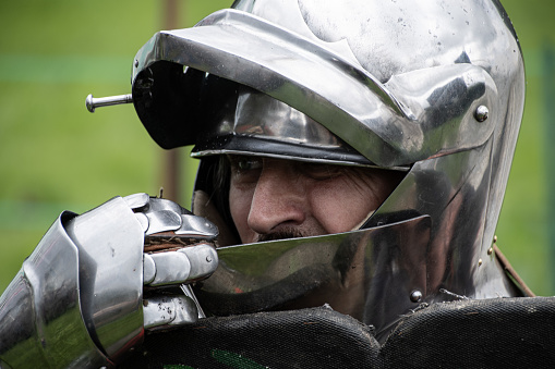 Fighting medieval knights in armor in nature