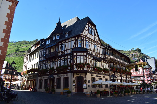 Bacharach, Germany - 09/05/2023: old town street with half-timbered buildings